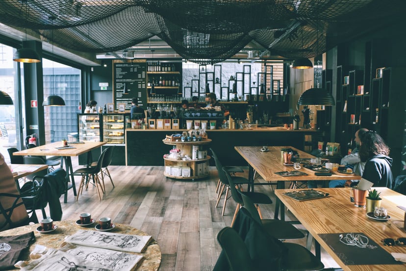 Image of a cafe to accompany the article: How Sustainable is Cafe Packaging Photo by Petr Sevcovic on Unsplash